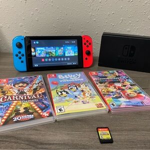 Nintendo Switch with Blue and Red Joy-Con and Game Bundle